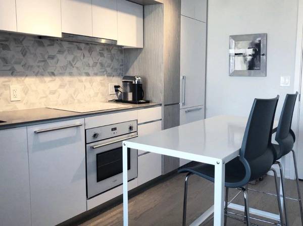 Furnished Condo Rental-Stylish Studio Suite, City Views, Clever Design