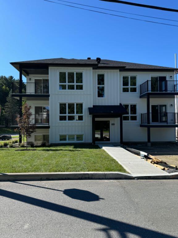 Logement neuf avec garage à louer