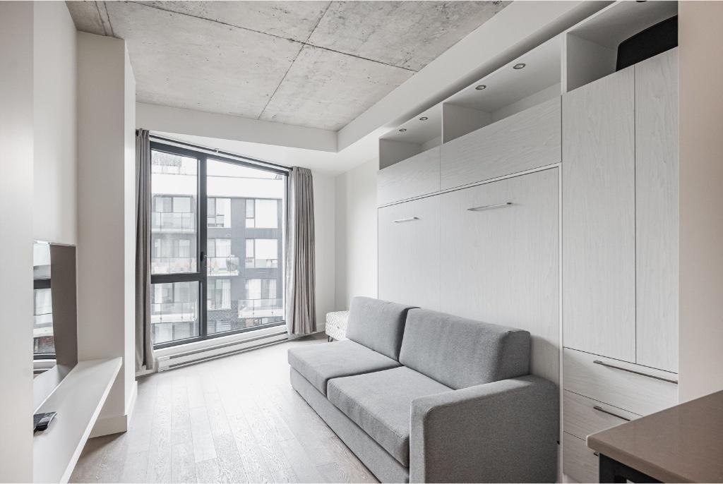 Studio a louer Griffintown avec gym, salle de sport, terrasse & piscine sur le toit