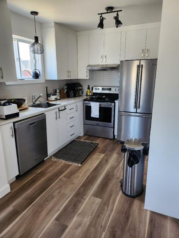 Très beau logement dans les champs Élysées à Notre dame des Prairies disponible 1 mars 2025