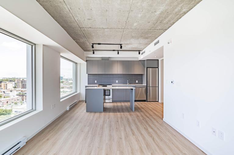 3 1/2 dans un projet locatif moderne à Place Gare Viger