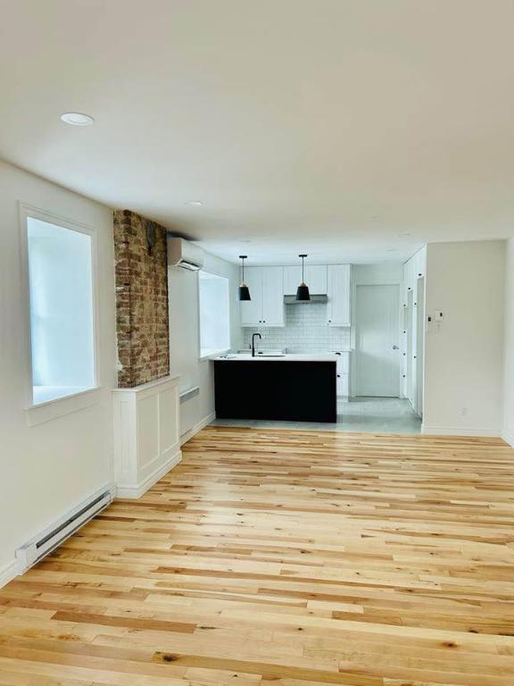 Loft avec chambre fermée à louer dans le Vieux-Lévis – Maison ancestrale complètement rénovée