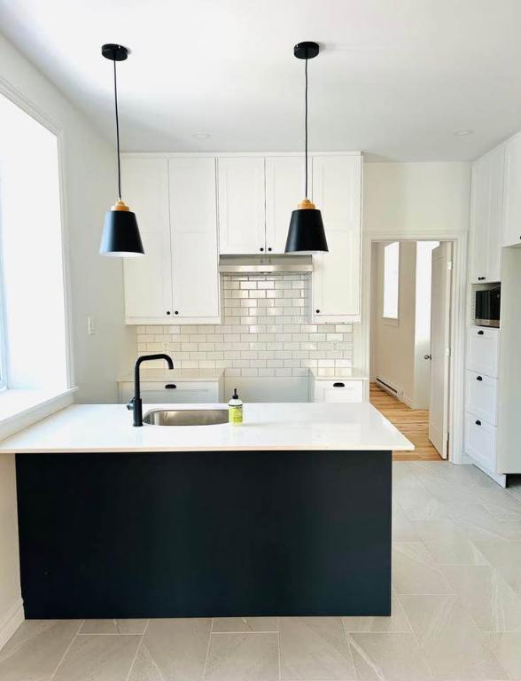 Loft avec chambre fermée à louer dans le Vieux-Lévis – Maison ancestrale complètement rénovée