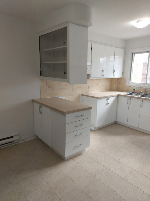 Haut Duplex 5 1/2 à Louer