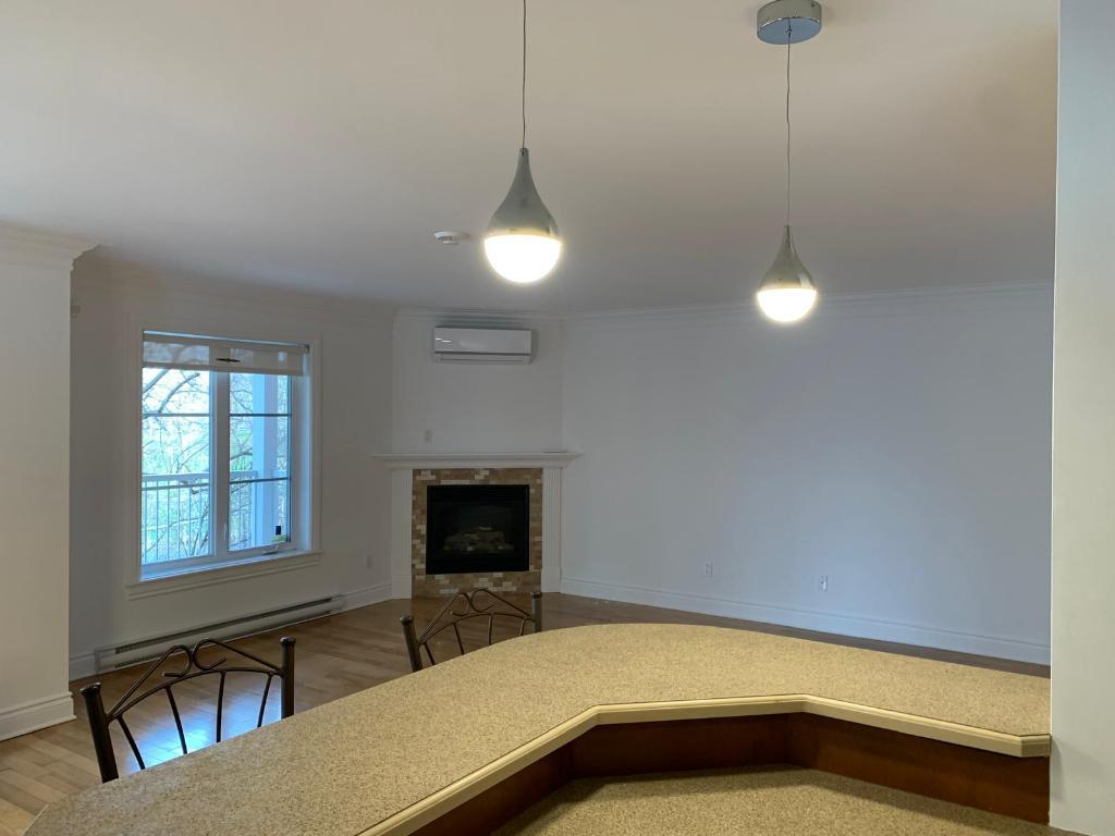 Condo locatif 4 1/2 adossé au parc Michel Chartrand à Longueuil