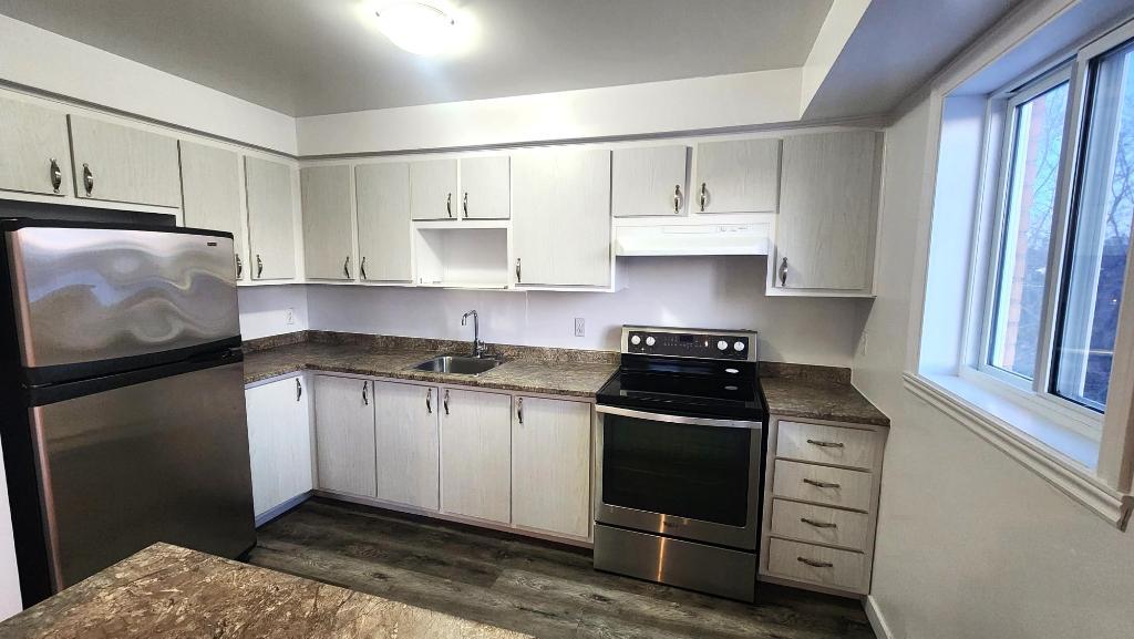 Joli appartement 4 1/2 style-condo à Brossard - Disponible IMMÉDIATEMENT!