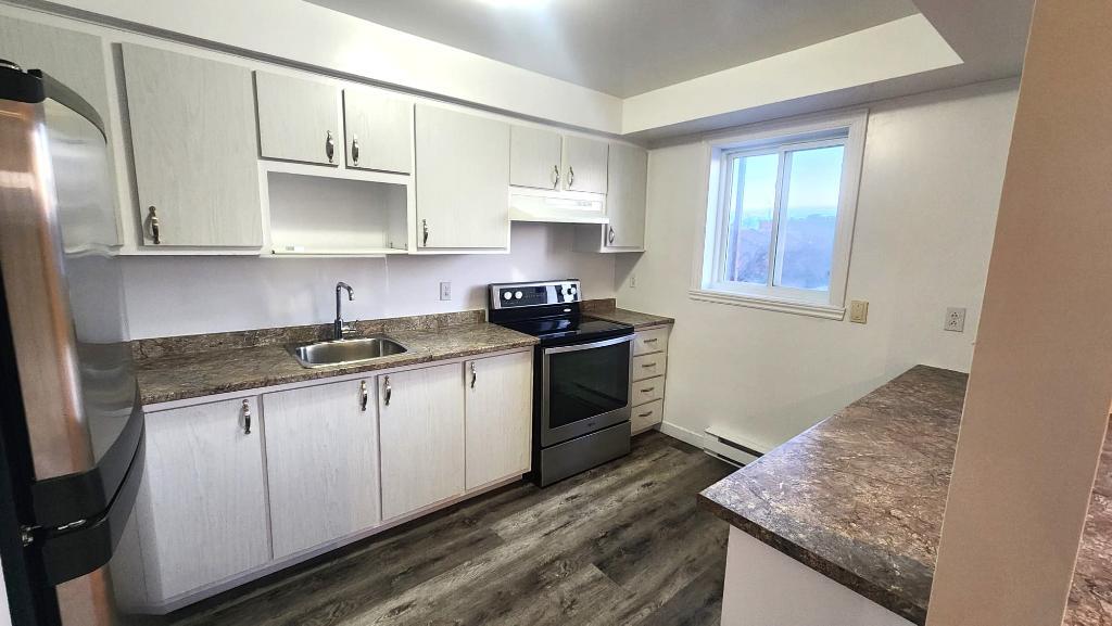 Joli appartement 4 1/2 style-condo à Brossard - Disponible IMMÉDIATEMENT!
