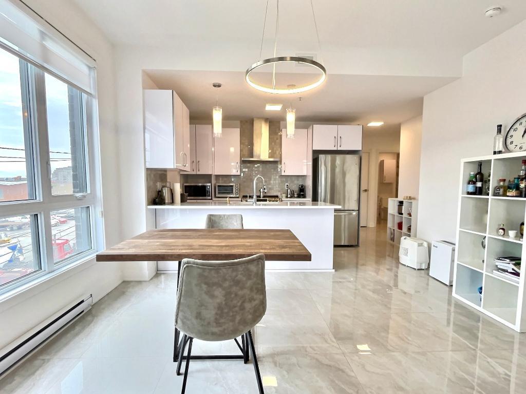 Condo avec garage et électroménagers, 2 chambres, 2 salles de bain – Cité Centrale, Saint-Léonard