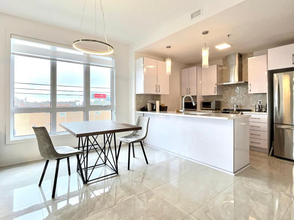 Condo avec garage et électroménagers, 2 chambres, 2 salles de bain – Cité Centrale, Saint-Léonard
