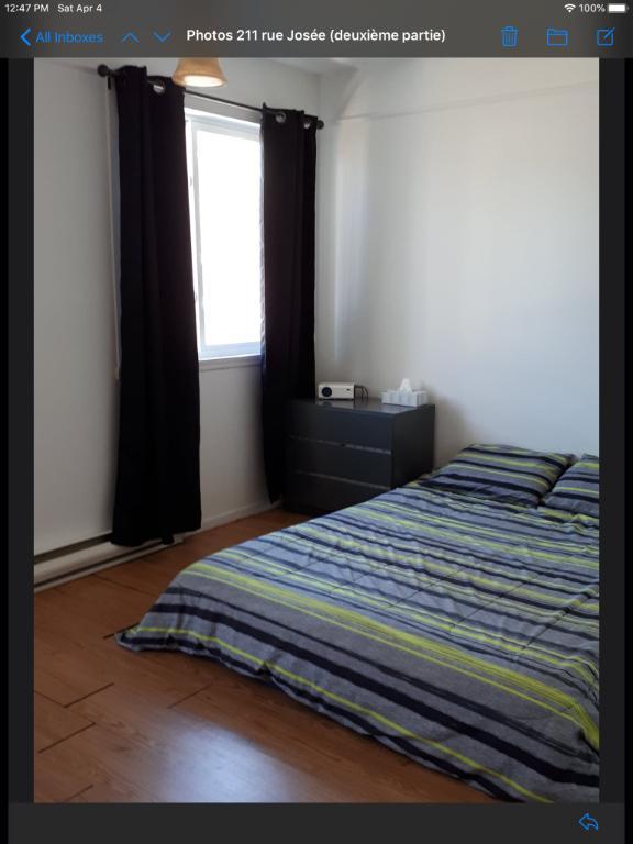 Très grand 5 ½ demi sur Deux Etages dans un quadruplex