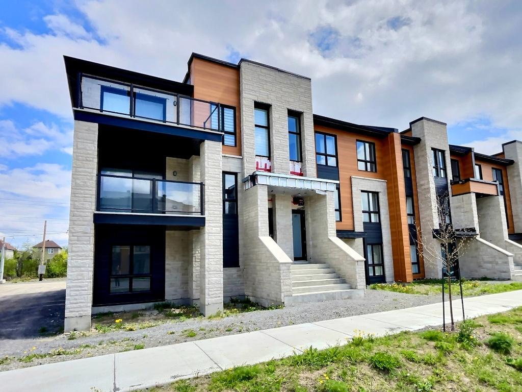 Condo 4 ½ Gare Ste-Rose Laval – 2 chambres, 2 salles de bain – 1 302 pi² – Garage inclus