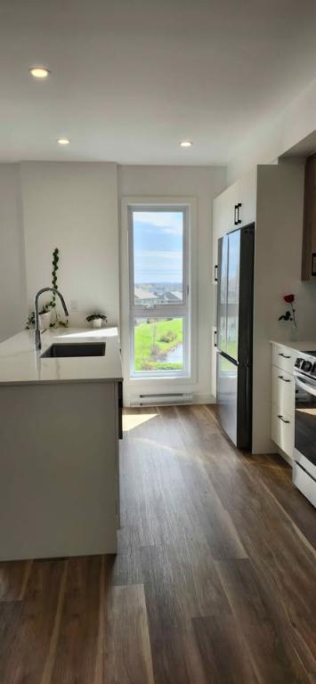 4 1/2 + bureau à louer 1er juillet, rue Mozart, Lévis, quartier Umano * Remise de 500$*