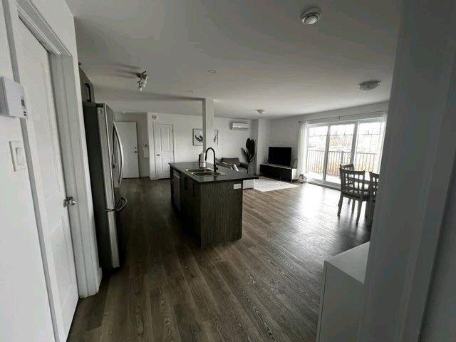 Grand 5 1/2 à louer style condo au 1er étage