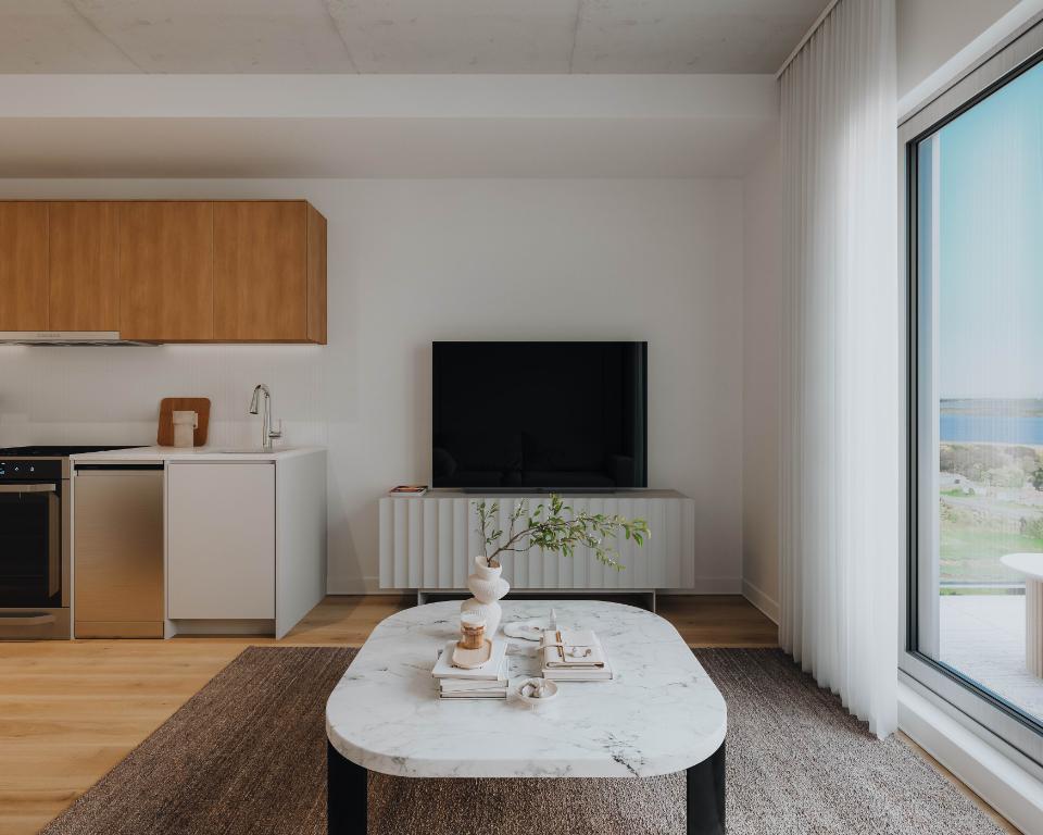 Altera habitats locatifs : Là où la nature s’élève. Condo à louer Château-Richer - appartement / logement