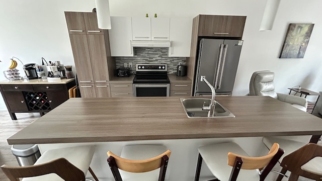 Condo 4 1/2 à Aire Ouverte Sur 2 étages