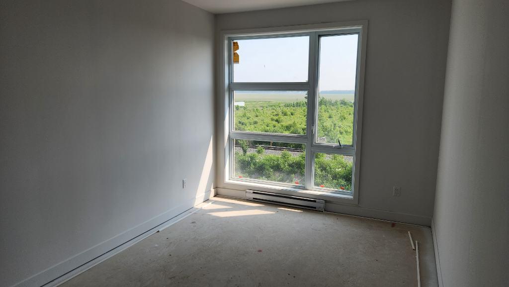 Condo Moderne 2 Chambres, 1 Salle de Bain à Louer – 2080 $/mois (Stationnement Inclus)