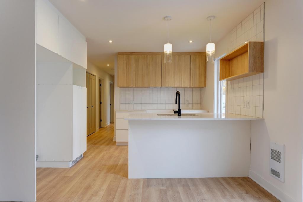 Maison 5 1/2 rénovée à St-Eustache - cour arrière - 1er août