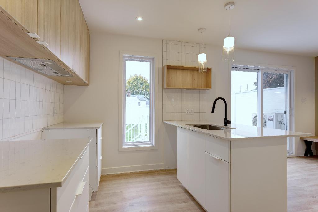 Maison 5 1/2 rénovée à St-Eustache - cour arrière - 1er août