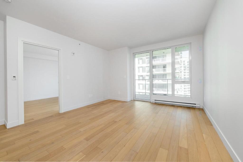 Condo 3 1/2 de luxe 2025 à louer Centre-ville de Laval - 1 chambre