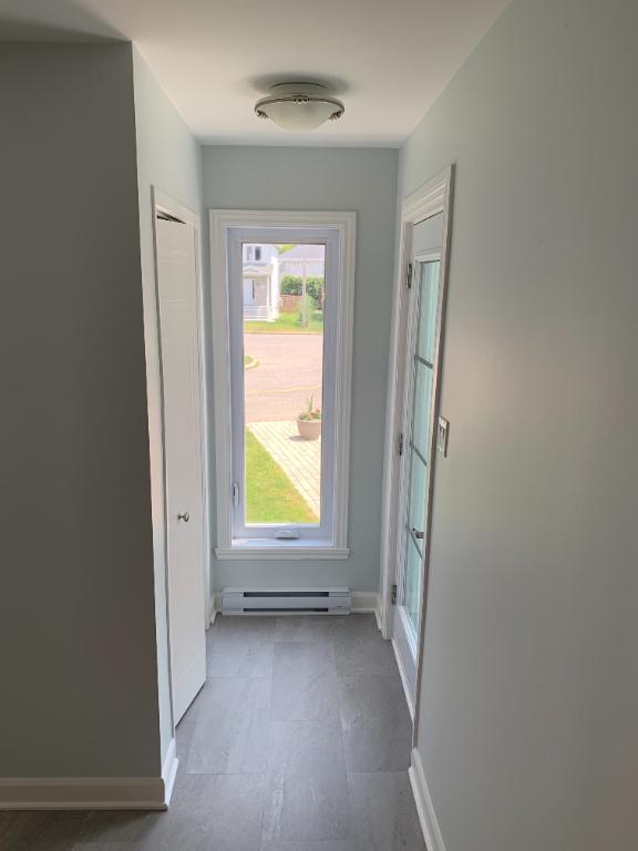 Logement 6 1/2 style semi-détaché dans triplex Vaudreuil-Dorion