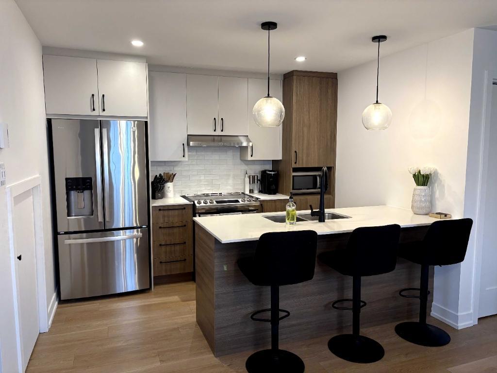 Condo de 2 chambres au 1er étage pour 1er août à St-Amable