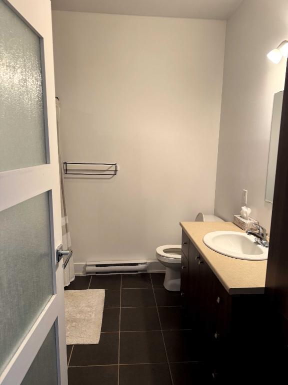 Condo neuf 3 1/2 meublé avec garage