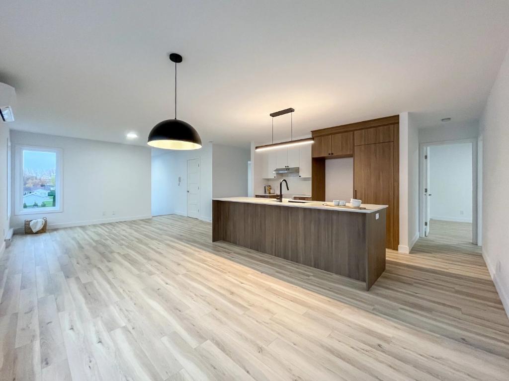 Condo 5 1/2 dernier étage