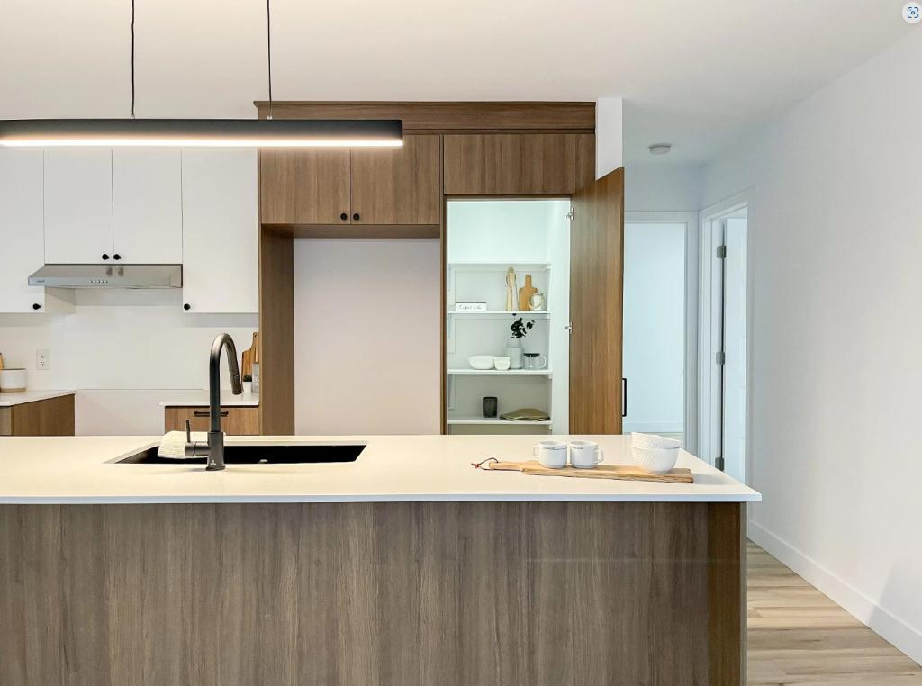 Condo 5 1/2 dernier étage
