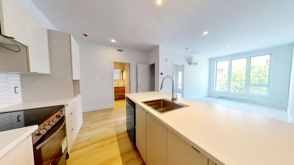 3 1/2 DANS IMMEUBLE NEUF