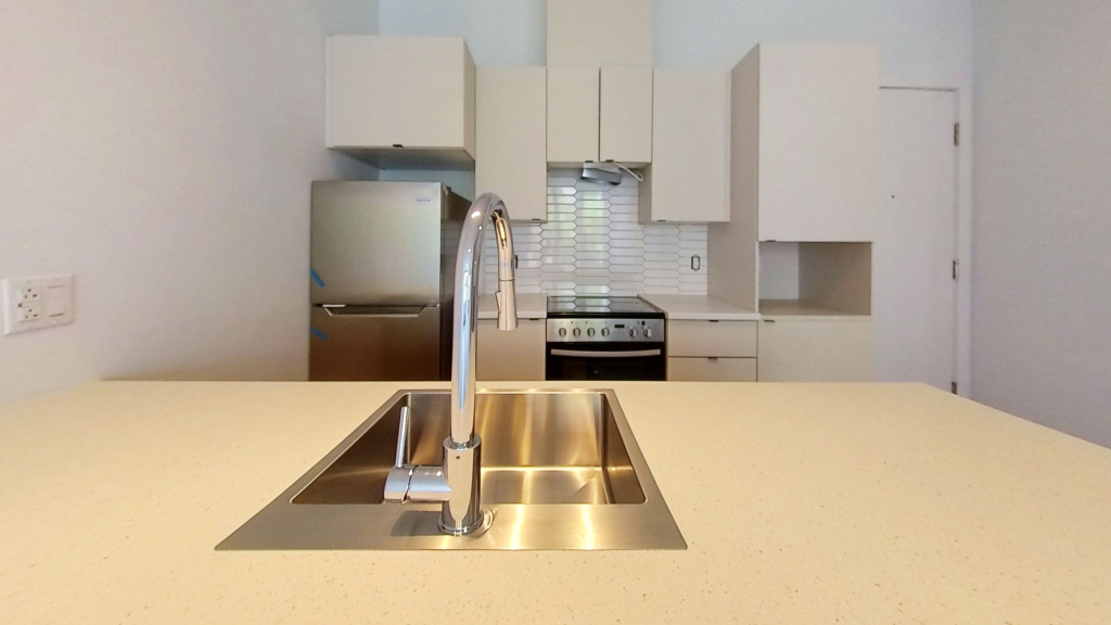 3 1/2 DANS IMMEUBLE NEUF