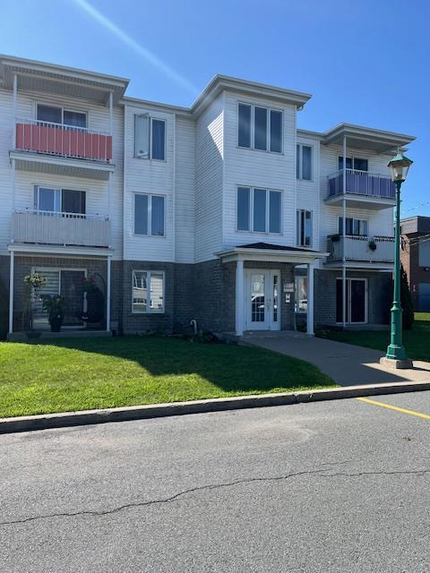 4 1/2 Saint-Basile-le-Grand, centre-ville, logement style condo, rez-de-chaussée