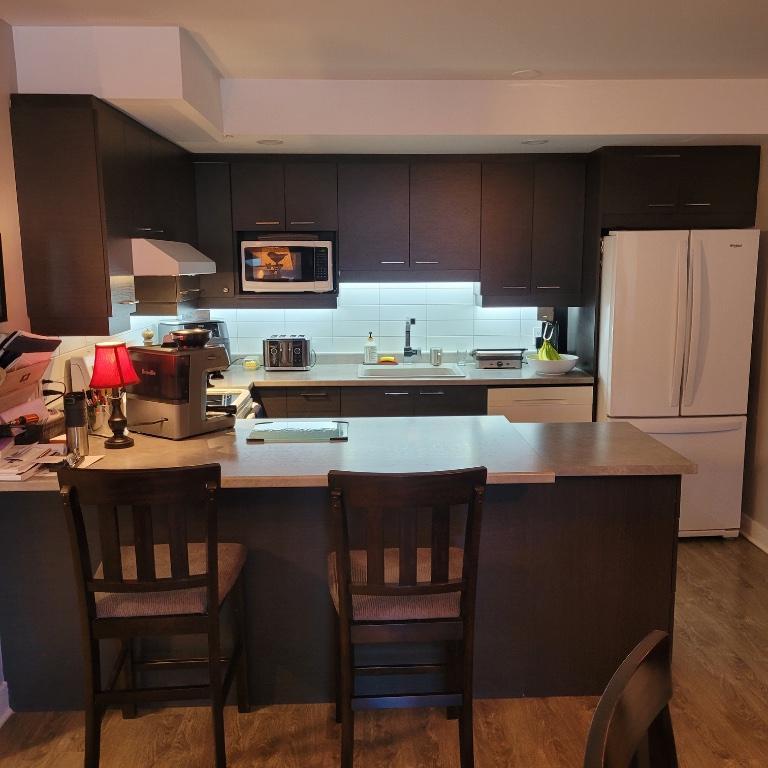Beau grand 5 1\2 style condo