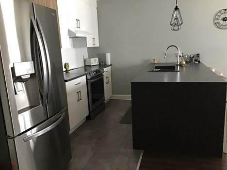 5 1/2 condo locatif - rez de chaussée