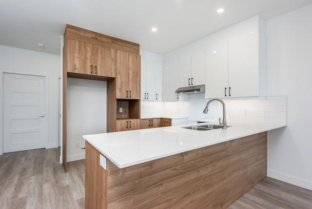 Grand appartement 5 ½ moderne à louer à Sutton – Logement lumineux, spacieux et entouré de nature !