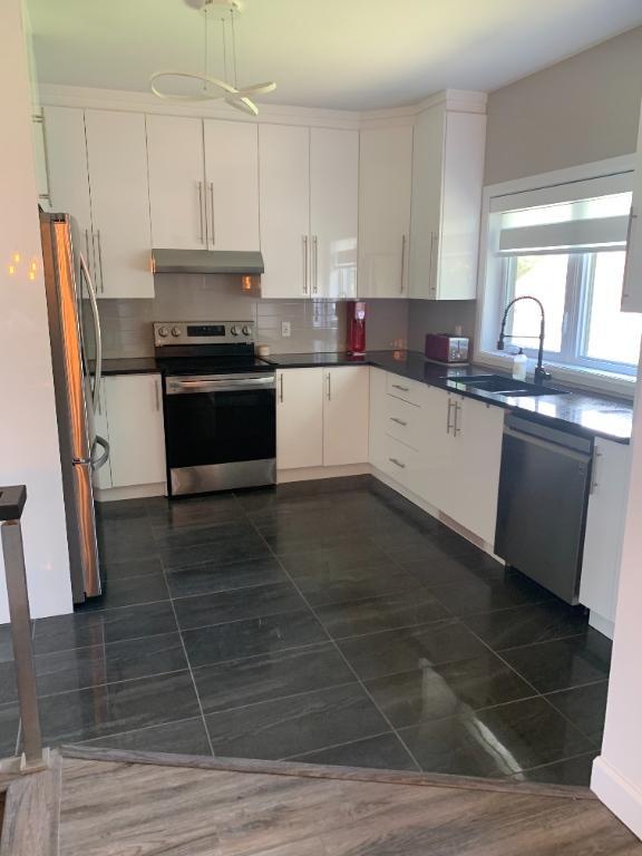 Maison à louer – 3 chambres, 2 salles de bain, cour privée, patio et spa (1er novembre) semi-meublé - Mascouche