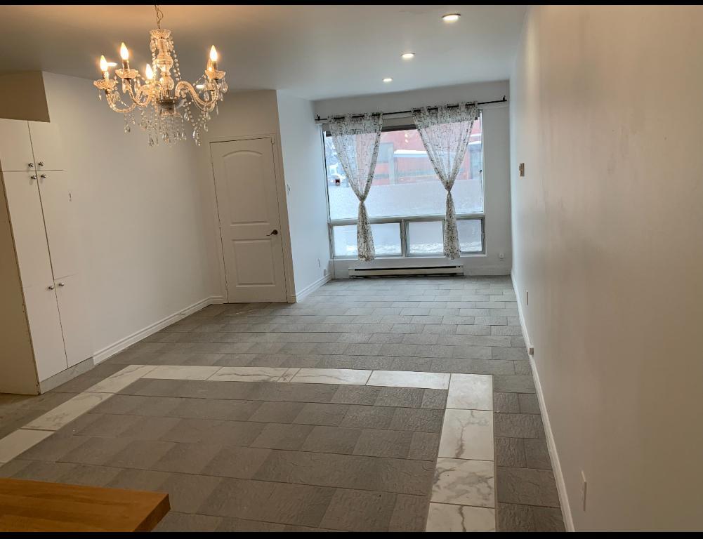 Appartement Rdc stationnement privé