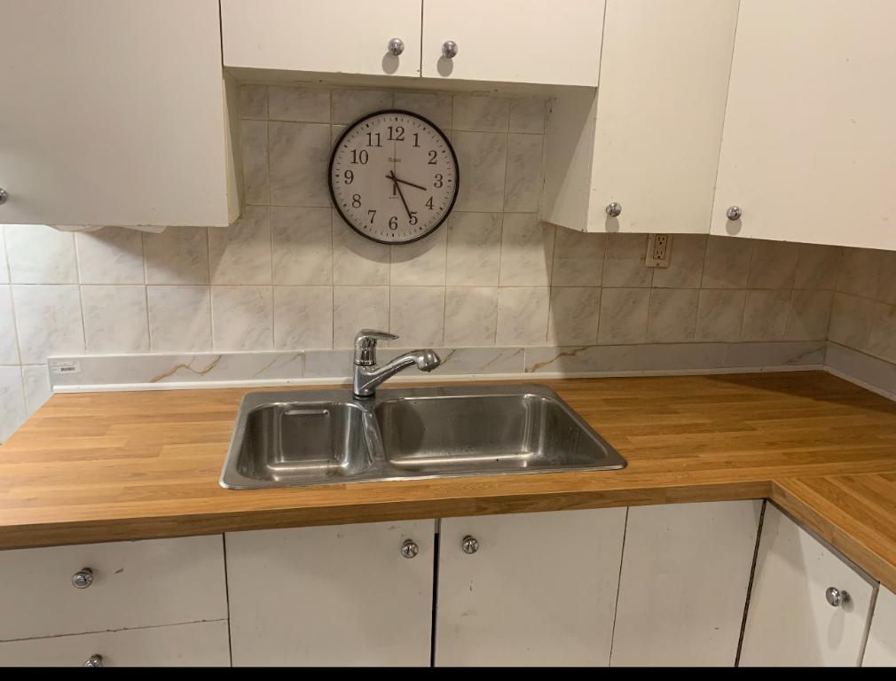 Appartement Rdc stationnement privé
