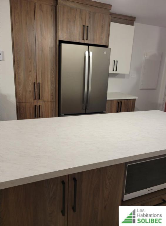 Logement 5 1/2 (rez-de-jardin) DÉCEMBRE 2025