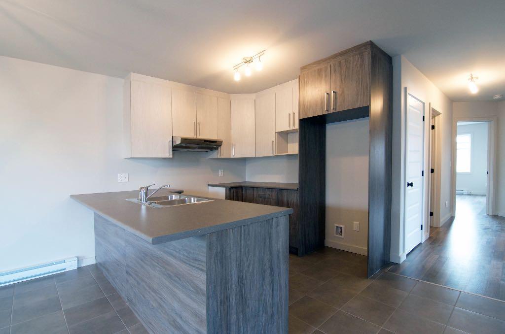 5 1/2 quadruplex Sherbrooke (Rock Forest) - 1ER DÉC.