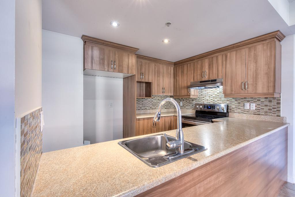 Superbe Condo 2 Chambres + Garage à Chomedey