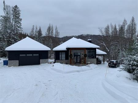 Logement 3 1/2 de 520 pied carré remis à neuf; secteur de villégiature dans une rue privée à Morin Heights; près des services